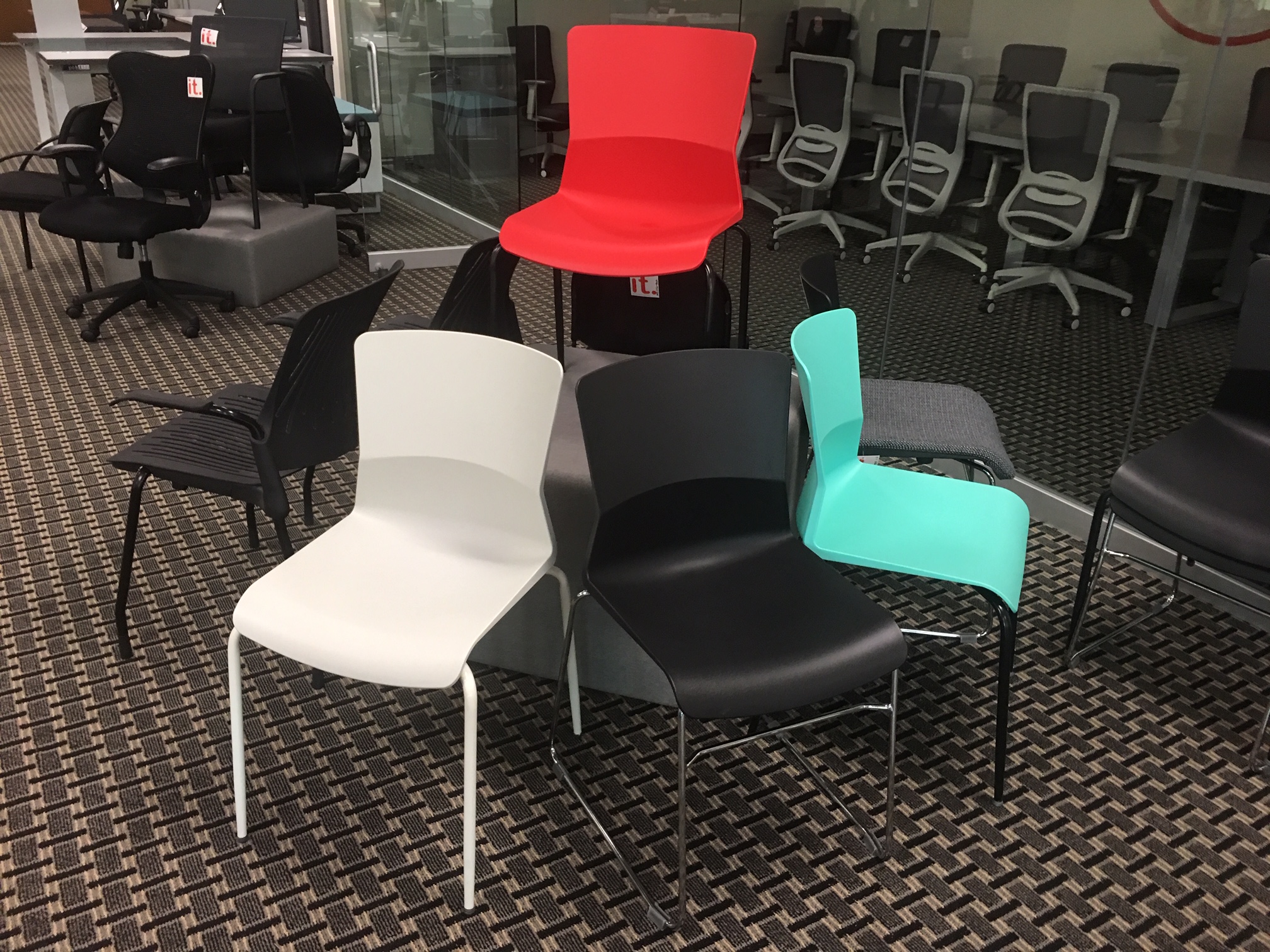 Black bar-height break room chairs at table