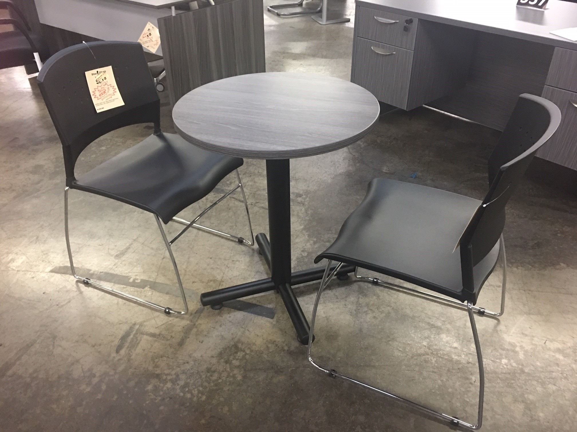 Simple break room chairs around a table